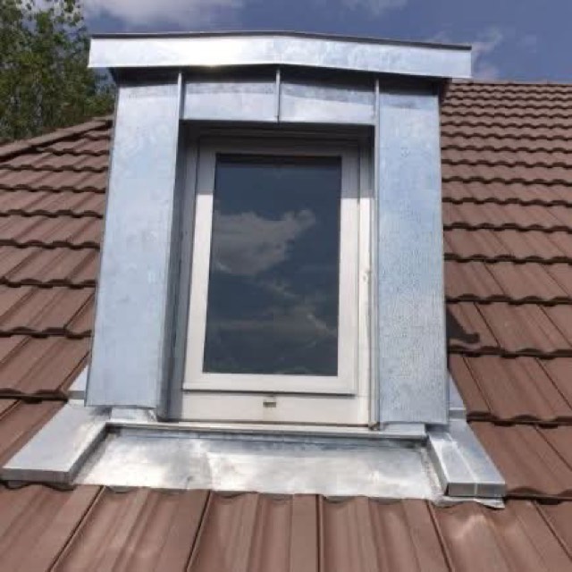 Finished dormer roof detail with zinc flashing