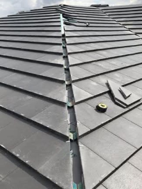 Dry verge ridge line detail on a tiled roof