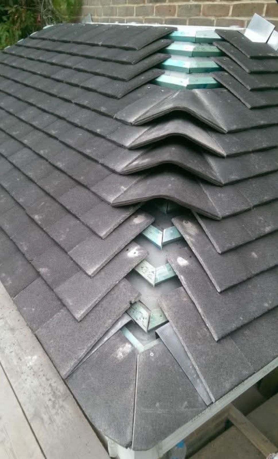 Close-up of interlocking valley tiling detail on a pitched roof